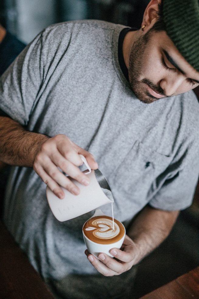 guy pouring detroit bold coffee